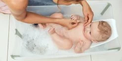 Stokke® Flexi Bath® Bundle Newborn -Baby Care Shop EMO FlexiBath TranspGreen Newborn 1400x700 92980 48844 273882 39973.1663188509